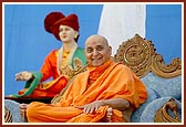 Swamishri in a divine, jovial mood during a satsang assembly