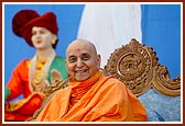 Happily responds during a satsang assembly