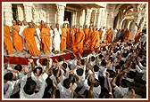 During Swamishri's pradakshina at the Smruti Mandir, students of Sarangpur Gurukul proclaim the jai-nad