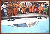 Swamishri blesses a youth for doing the rangoli
