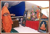 Swamishri performs murti-pratishtha rituals of murtis for hari mandirs in Gunatitanagar (Modhpar), Yagnapurushnagar (Gariya) and Gariya (old village) that were reconstructed by BAPS after the earthquake