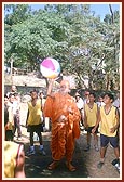 Swamishri participates with the students while they play