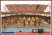 A traditional dance is performed by youths during the assembly