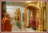  Swamishri performs pujan and arti of Thakorji on the 1st murti-pratishtha anniversary (patotsav)