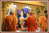 In place of the canvas murtis, Swamishri performs the murti-pratishtha of marble murtis of Shri Akshar Purushottam Maharaj
