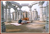 Ornate and towering pillars inside the Akshardham monument construction