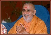 Swamishri in a joyful mood during the singing of bhajan