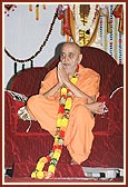 Swamishri is honored with a garland&nbsp;