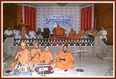 Sadhus sing bhajans during a felicitation assembly