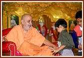 Blesses a child
