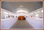 Swamishri on an observation tour of the newly built BAPS gaushala 