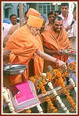 Performing the foundation-stone laying ceremony of the mandir-extention  project