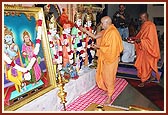 Swamishri performs the murti-pratishtha rituals of pujan and arti of Shri Akshar Purushottam Maharaj and deities for the hari mandirs in Nenpur and Sankhej of Amdavad district