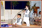 Members of BAPS Children's Forum, Amdavad, perform a kirtan-bhakti program in Swamishri's morning puja 