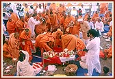 ... places a 'padma shila' on top of the nidhi-kumbh