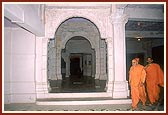 Swamishri performs pradakshina of the memorial mandir of Shri Jaga Bhakta