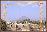 A view of the ongoing construction of a grand BAPS shikharbaddh mandir in the shadow of Siddhachal (Mt. Girnar)
