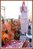 Swamishri places the pillar himself by operating the crane consol