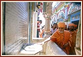 Darshan at shrine in the mandir pradakshina