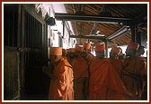 Swamishri heads toward the Vasudevnarayan's Orda at Dada Khachar's north facing Darbar (Uttaradabarna Orda) and does darshan