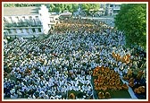 Sadhus and devotees during the morning puja