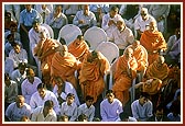 Sadhus and devotees during puja darshan 