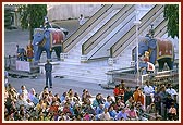Sadhus and devotees during the morning puja