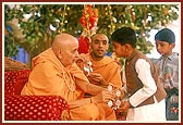 Under the auspices of the Golden Anniversary Celebration BAPS Children's Forum, children who were declared winners in recitation competitions were blessed with awards by Swamishri