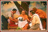 Swamishri inaugurates a helmet for motorcyclists specially made by the Sanstha for BAPS volunteers