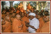Swamishri converses with Shri Ragha Bharwad