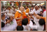 Swamishri joins the balaks as they dance joyfully