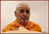 Swamishri laughs during a conversation with the sadhus