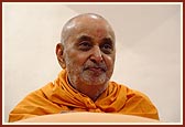 Swamishri laughs during a conversation with the sadhus