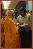 Swamishri blesses a baby boy