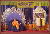 Swamishri seated in public assembly