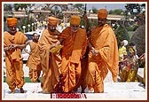 Swamishri climbs the mandir steps