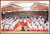 Pujya Mahant Swami, together with the parshads and sadhaks, perform the diksha mahapuja ceremony