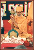 Pujya Mahant Swami, together with the parshads and sadhaks, perform the diksha mahapuja ceremony