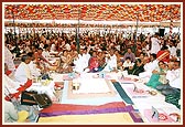 Devotees seated in the yagna