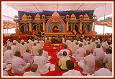 Pujya Mahant Swami, together with the parshads and sadhaks, perform the diksha mahapuja ceremony