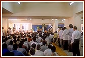 Blesses the satsang assembly