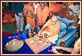 Swamishri performs the foundation-stone laying ceremony of a new BAPS English medium residential school for Raisan, Amdavad