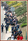 Overhead view of the walkers along the main road leading to the Mandir