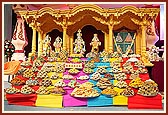 Annakut is offered to the newly installed images of Shri Akshar Purushottam Maharaj, Shri Radha Krishna Dev, Guru Parampara, Shri Ganpatiji and Shri Hanumanji
