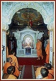 Performing pradakshina of Akshar Deri