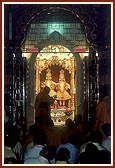 Performs arti on Diwali day