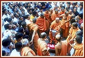 &nbsp;After Thakorji's darshan, Swamishri blesses the devotees while descending the mandir steps