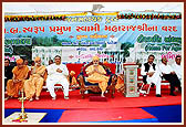 Swamishri during the inauguration of Hiramani Chhatralay (school hostel) and then blesses the assembly 