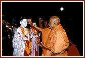 Swamishri performs the murti-pratishtha rituals of murtis of BAPS Shri Swaminarayan Mandirs (sanskardhams) for Memnagar and Odhav suburbs