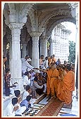 Swamishri meets devotees in the mandir pradakshina 